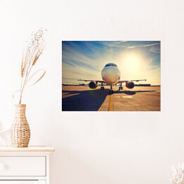 Plakat samoprzylepny Duży samolot na tle wschodu słońca