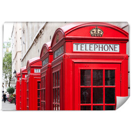 Tradycyjne czerwone budki telefoniczne w Londynie