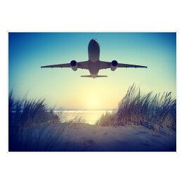 Plakat Samolot lecący nad plażą