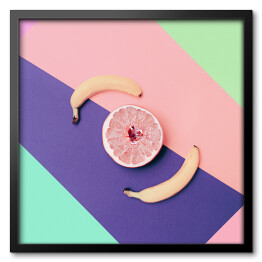 Obraz w ramie Grejpfrut i banany na wzorzystym tle