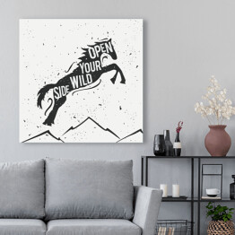 Obraz na płótnie Skaczący koń i góry