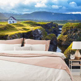Fototapeta Islandzki dom na skałach
