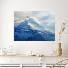 Plakat Wschód słońca w górach pokrytych śniegiem
