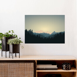 Plakat Ciemny las na tle gór w trakcie wschodu słonca