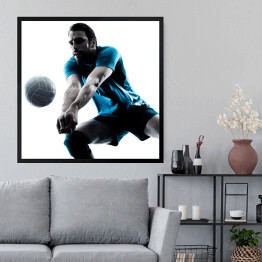 Obraz w ramie Sylwetka człowieka podczas gry w piłkę siatkową