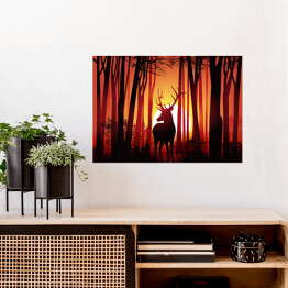 Plakat samoprzylepny Jeleń w lesie na tle złocistego zachodu słońca 