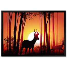 Plakat w ramie Jeleń w lesie na tle złocistego zachodu słońca