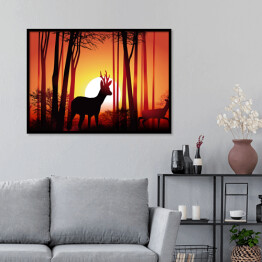 Plakat w ramie Jeleń w lesie na tle złocistego zachodu słońca
