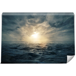 Fototapeta samoprzylepna Zachód słońca na wzburzonym morzu