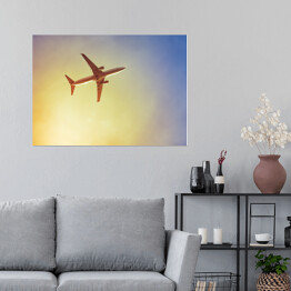 Plakat Samolot przecinający promienie słońca