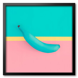 Obraz w ramie Niebieski banan na kolorowym tle