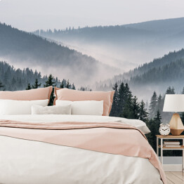Fototapeta winylowa zmywalna Mglisty krajobraz - widok z gór na dolinę pokrytą mgłą