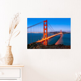 Plakat Golden Gate Bridge w San Fransisco w Kalifornii rozświetlone złotymi światłami