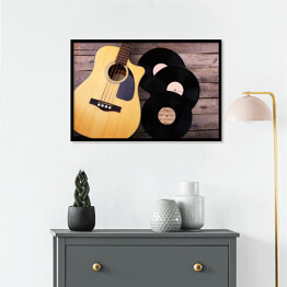 Plakat w ramie Gitara i winylowe płyty na drewnianym stole