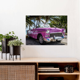 Plakat Różowy retro samochód przy tropikalnej plaży