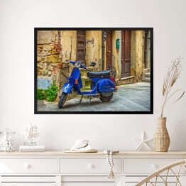 Obraz w ramie Niebieski skuter na ulicy na starym mieście w Toskanii