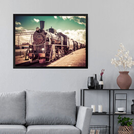 Obraz w ramie Stara parowa lokomotywa na tle pastelowego nieba