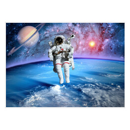 Plakat Astronauta oraz Saturn we Wszechświecie