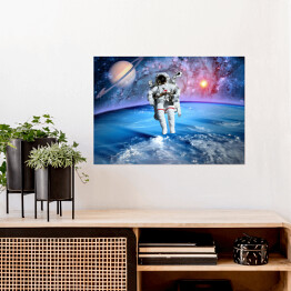 Plakat samoprzylepny Astronauta oraz Saturn we Wszechświecie