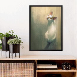 Obraz w ramie Młody biały kot patrzący w górę