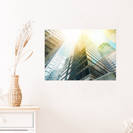 Plakat samoprzylepny Nowoczesny budynek mocno oświetlony promieniami słońca