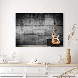 Obraz na płótnie Nowoczesna gitara elektryczna oparta o ścianę