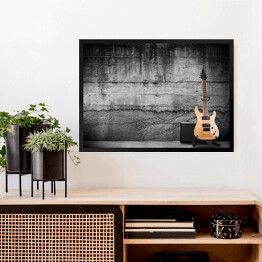 Obraz w ramie Nowoczesna gitara elektryczna oparta o ścianę