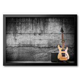 Obraz w ramie Nowoczesna gitara elektryczna oparta o ścianę