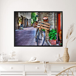 Obraz w ramie Stary rower z drewnianą skrzynią przy ścianie z cegły w San Gimignano