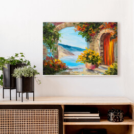 Obraz na płótnie Obraz olejny - dom blisko morza ozdobiony kolorowymi kwiatami