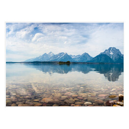 Plakat samoprzylepny Park Narodowy Grand Teton - kamienisty brzeg jeziora i wysokie góry w tle
