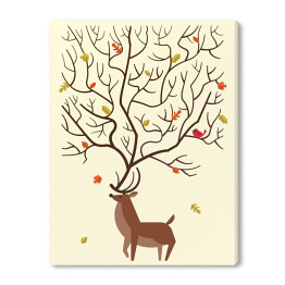 Jeleń na tle liści spadających z drzewa 