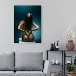 Obraz na płótnie Seksowna dziewczyna siedząca tyłem