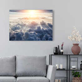 Obraz na płótnie Pierzaste chmury oświetlone pierwszymi promieniami słońca