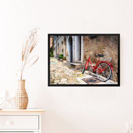 Obraz w ramie Opuszczony rower na włoskiej ulicy w Toskanii