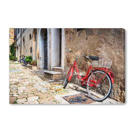 Obraz na płótnie Opuszczony rower na włoskiej ulicy w Toskanii