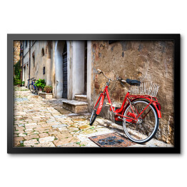 Obraz w ramie Opuszczony rower na włoskiej ulicy w Toskanii