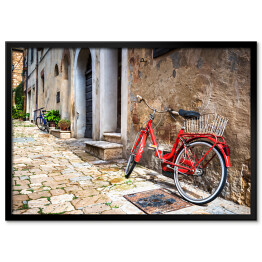 Plakat w ramie Opuszczony rower na włoskiej ulicy w Toskanii