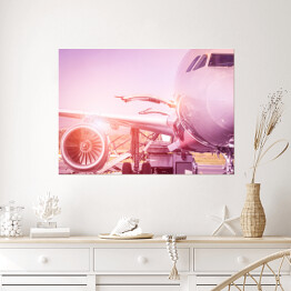 Plakat samoprzylepny Samolot w różowym świetle