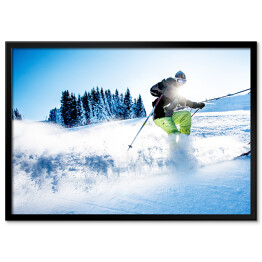 Plakat w ramie Człowiek zjeżdżający na nartach 