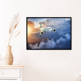 Plakat w ramie Samolot wśród chmur w blasku słońca