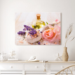 Obraz na płótnie Olejek z lawendą i kwiatem róży