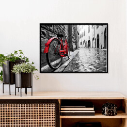 Plakat w ramie Retro czerwony rower na chodniku w starym miasteczku