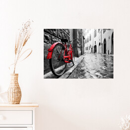 Plakat Retro czerwony rower na chodniku w starym miasteczku