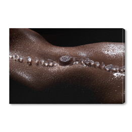 Obraz na płótnie Opalony brzuch z kroplami wody