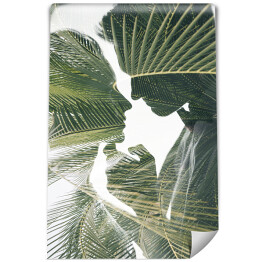 Podwójna ekspozycja - młoda para w połączeniu z gałązkami palmowymi