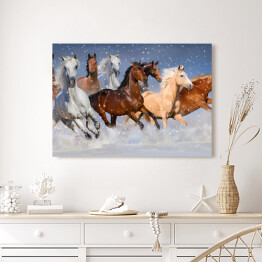 Obraz na płótnie Stado koni galopujących w zimie