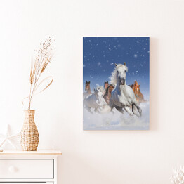 Obraz na płótnie Stado koni biegnących szybko w śniegu