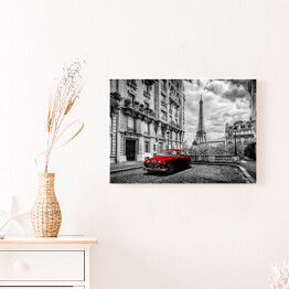 Obraz na płótnie Czerwona limuzyna, w tle Wieża Eiffla we Francji