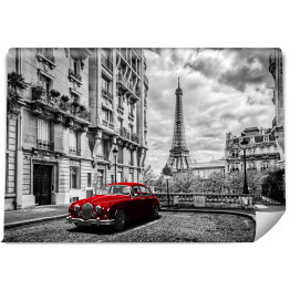 Fototapeta Czerwona limuzyna, w tle Wieża Eiffla we Francji